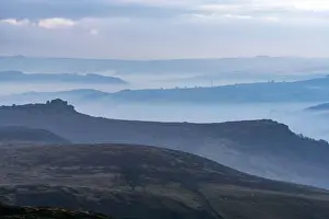 Layers of hills in the mist, Peak District National park, UK