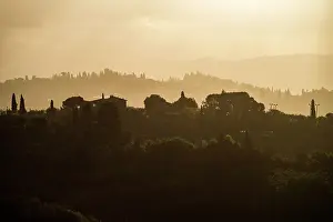 Layers of hills at sunrise in Tuscany