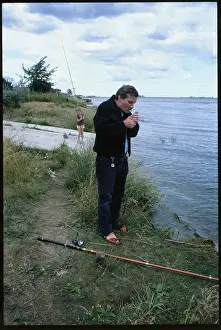 Lech Walesa Fishing and Smoking