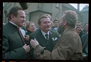 Lech Walesa and Reverend with Reporters