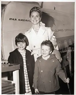 Lee Remick and Children Board Airplane