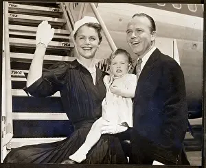 Airport Prints: Lee Remick Poses with Husband and Daughter