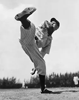 Lefty Gomez with Leg Raised to Pitch