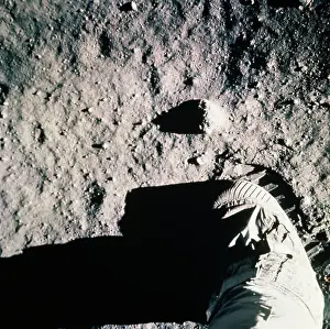 A Leg and a Footprint In the Moons Surface