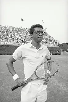 Legendary Tennis Professional Arthur Ashe Holding Racquet