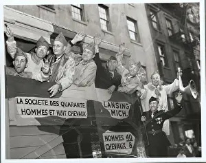 Legionnaires Waving from Parade Float