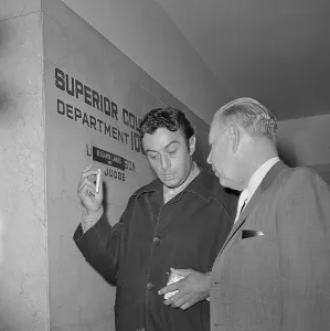 Drug Use Prints: Lenny Bruce Exiting Courtroom with Attorney
