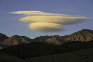 Death Valley National Park Collection: Lenticular clouds above mountains, Death Valley