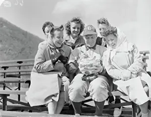 Leo Durocher Autographing a Baseball