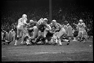 Leo Nomellini About to Grab Johnny Unitas
