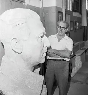 Leone Tomassi Working on Sculpture