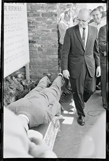 Lester Maddox Looking at a Dummy