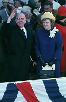 Lester Maddox Waving from Podium with His Wife Nearby