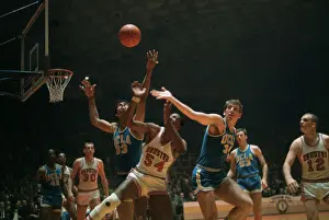 Lew Alcindor Reaching High for the Ball