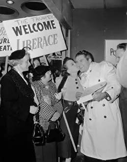 Paramount Prints: Liberace Holding Miniature Piano and Greeting Fans