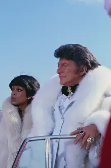 Liberace and Lola Falana Posing in White Furs