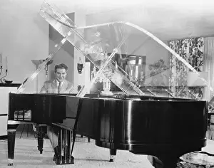 Plastic Prints: Liberace Playing Piano with Clear Lid