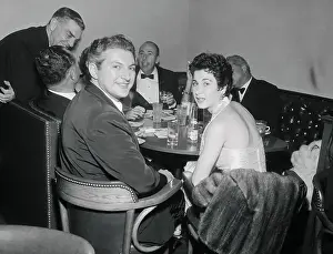 Liberace Prints: Liberace Sitting with Girlfriend