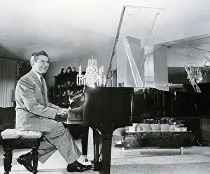 Liberace Prints: Liberace Sitting At Piano Playing