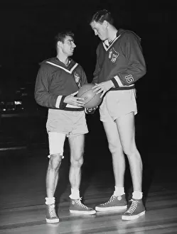 Prints of American basketball players Bill Lienhard and Clyde Lovellette (1929 - 2016) of the Kansas Jayhawks, the University of Kansas NCAA championship team Courtside Vibes: Stunning Basketball Prints: Bill Lienhard and Clyde Lovellette