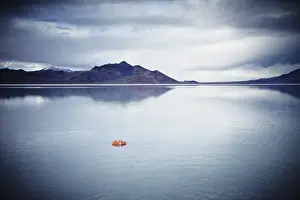 Prints of Life ring floating on water under stormy sky Stone Prints: Life ring floating on water under stormy sky