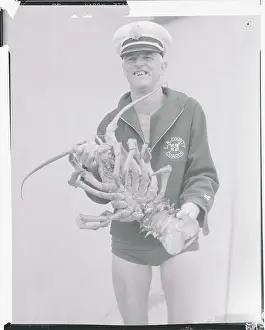 Lobster Prints: Lifeguard Displaying Large Lobster