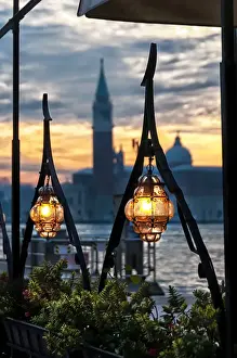 Electric Light Prints: Lighted lamps in the Venice sunset