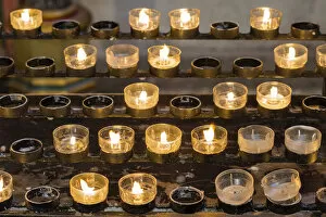 Images Dated 26th October 2014: Lighted votive candles in a church, Munich, Upper Bavaria, Bavaria, Germany