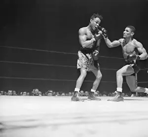 Punching Prints: Lightweight Boxer Punching Opponent in Bout