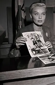Lili St. Cyr Showing Picture of Herself