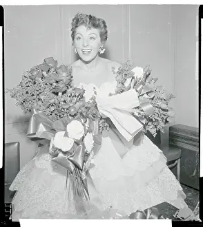 Lilliam Roth Smiling with Flowers