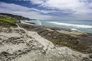 Limestone formations and a blowhole, Truman Bay, West Coast, South Island, New Zealand, Oceania
