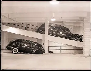 Limousines in Basement of Airport Terminal