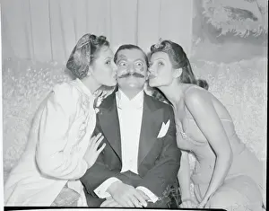 Linda Darnel and Rita Hayworth Kissing Jerry Colonna
