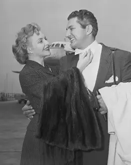 Liberace Prints: Line Renaud Adjusting Liberace's Attire