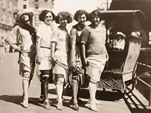 Images Dated 28th May 2015: Line of Women Showing their Garter Belts / Circa 1920 s