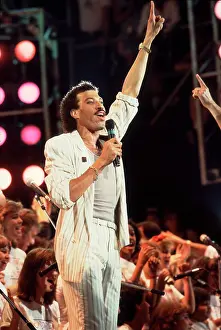 Iconic Concert Prints: Celebrate the Unforgettable Music Event That United the World: Lionel Richie On Stage At Live Aid