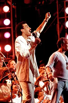 Iconic Concert Prints: Celebrate the Unforgettable Music Event That United the World: Lionel Richie On Stage At Live Aid