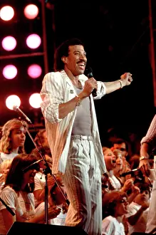 Iconic Concert Prints: Celebrate the Unforgettable Music Event That United the World: Lionel Richie On Stage At Live Aid