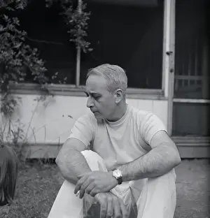 Lionel Trilling Sitting Outside and Smoking Cigarette