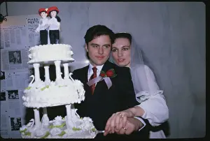 Lisa Evers and Curtis Sliwa Cutting Cake