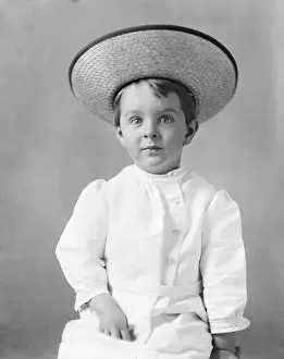 Little Boy Wearing Straw Hat
