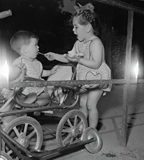 Ice Cream Prints: Little Girl Feeding Ice Cream To Younger Brother
