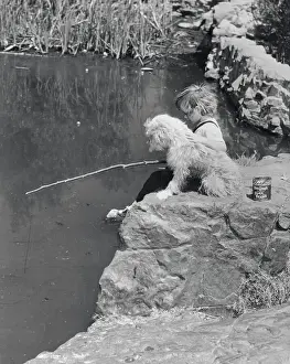 Little Girl Fishing in Pond