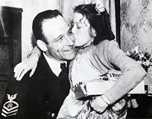 James Cook Prints: Little Girl Kisses Us Serviceman