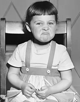 Little girl making a face