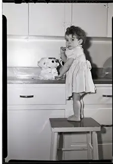Counter Prints: Little Girl Sneaking a Cookie from Cookie Jar