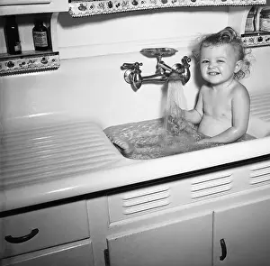 Sink Prints: Little Girl Taking Bath in Kichen Sink