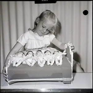 Little Girl And Toy Dolls