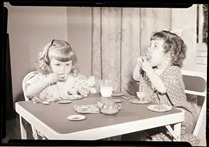 Little Girls Having Tea Party